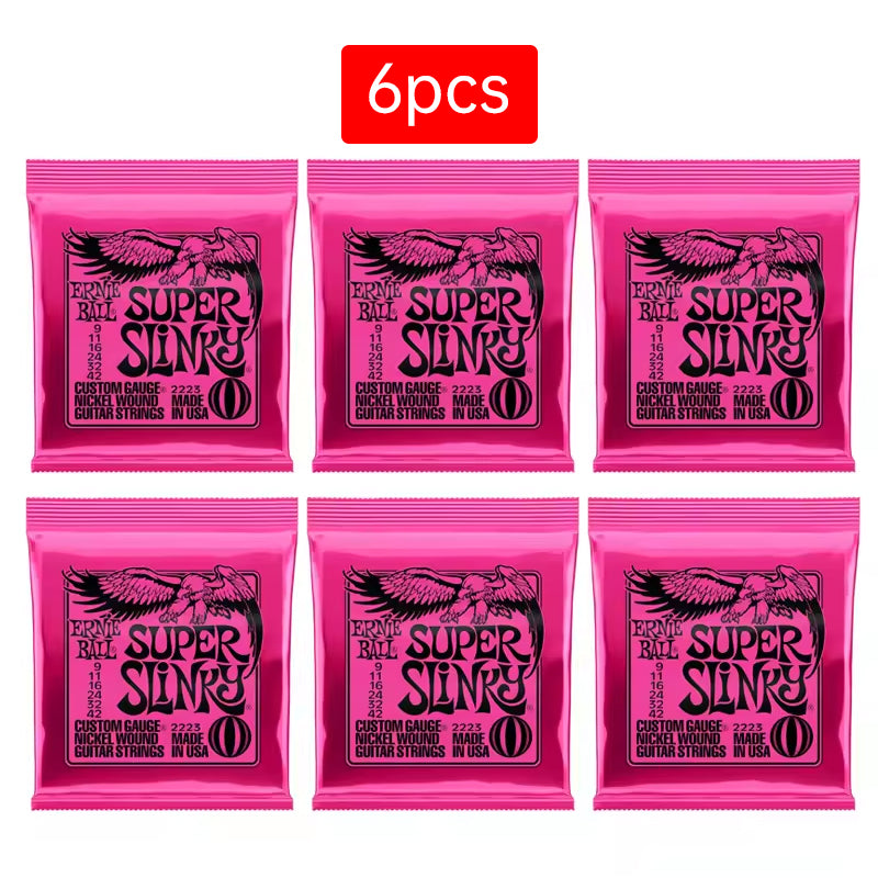 6 sets of Ernie Ball Slinky guitar strings (models 2003, 2215, 2223, 2221, nickel - wound) for electric & acoustic guitars